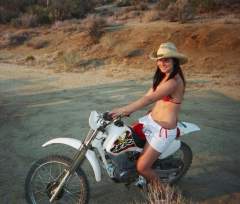 Naked Lady on a Motorbike - with Cowboy Hat