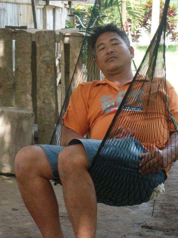 Filipino Farmworker taking his Siesta in a Duyan (Hamok)