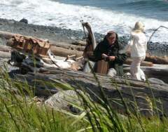 Man making Bird Houses from Driftwood