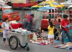 Happy, Smiling Faces - A lively Bangkok Street Scene