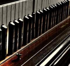 Very old piano keyboard photo smalloldmusic.jpg