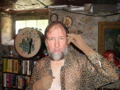 Peter Coukis in Animal Print Shirt and Gloves