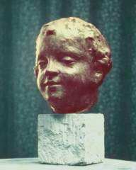 Angel, copper on plaster