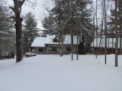 A Cabin On The Lake In Winter