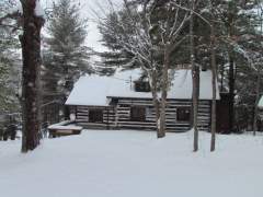 A Cabin On The Lake In Winter