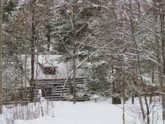 A Cabin On The Lake In Winter