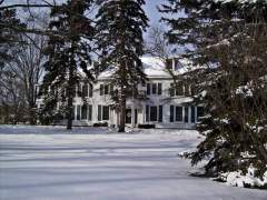 Woodframe Mansion in the snow - Napanee Ontario