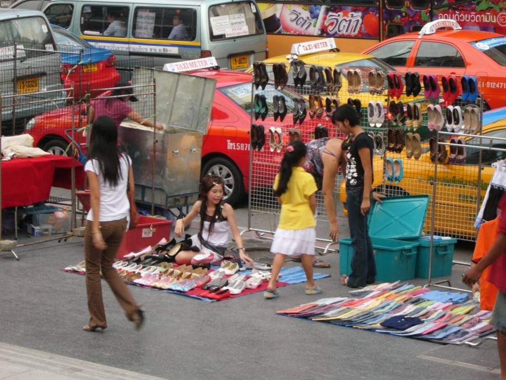 Bangkok Street Scene - (The two pretty young ladies just happened to be in there!)