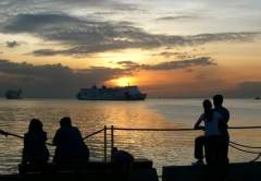 Romantic Manila Bay Sunset with Superferry passenger ship 
