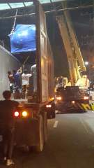 Unloading a heavy lift for a new high rise in Adriatico Street, Ermita, Manila