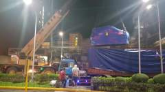 Night time construction work in Manila - Unloading some heavy equipment for a new high rise in Adriatico Street