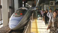 Passengers disembarking from JR 500 Shinkansen Bullet Train at Hakata Station