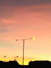 Sunset and lamplight
