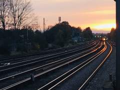 Sunset reflecting off the railway lines at Surbiton